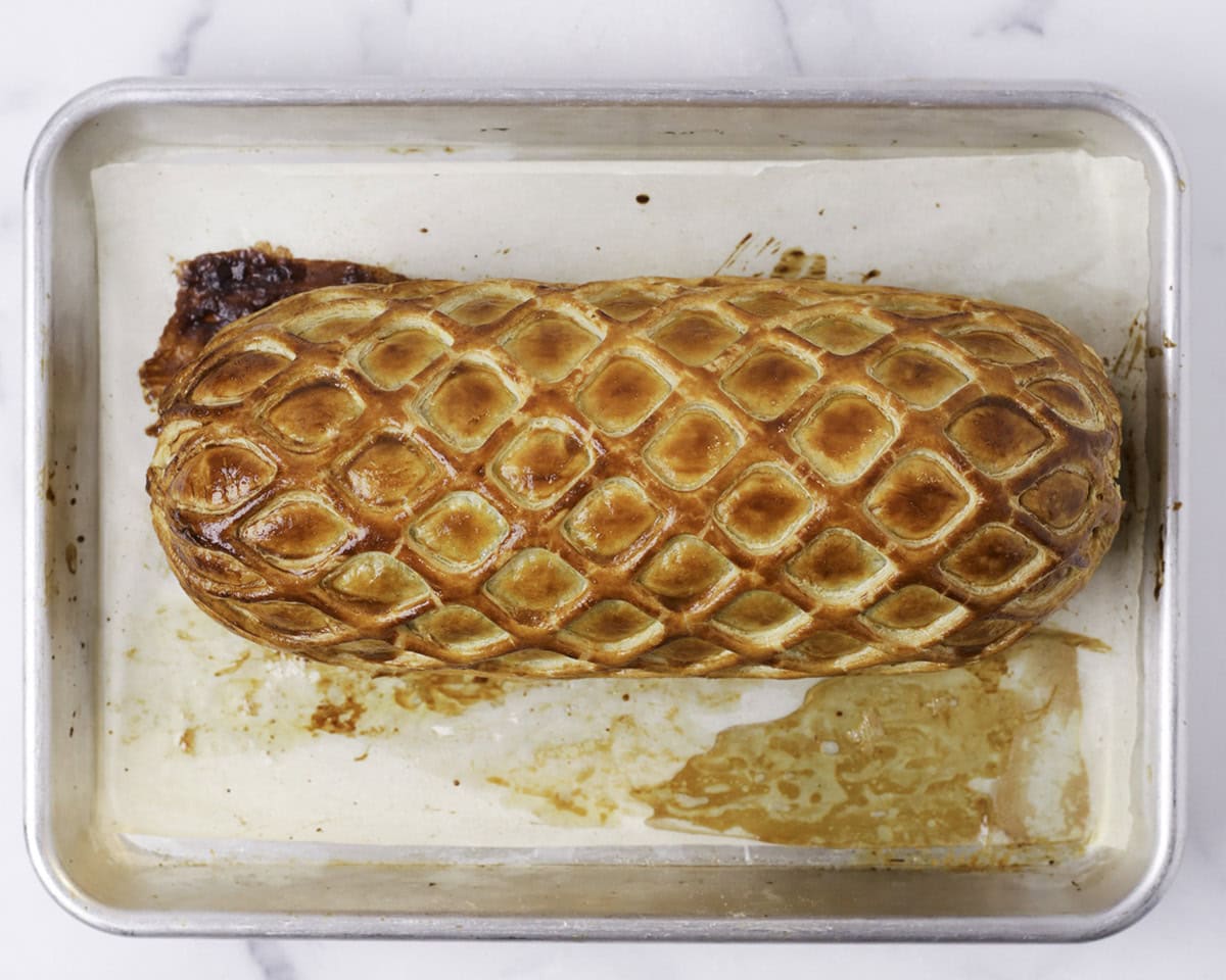 Wrapping the beef log with puff pastry
