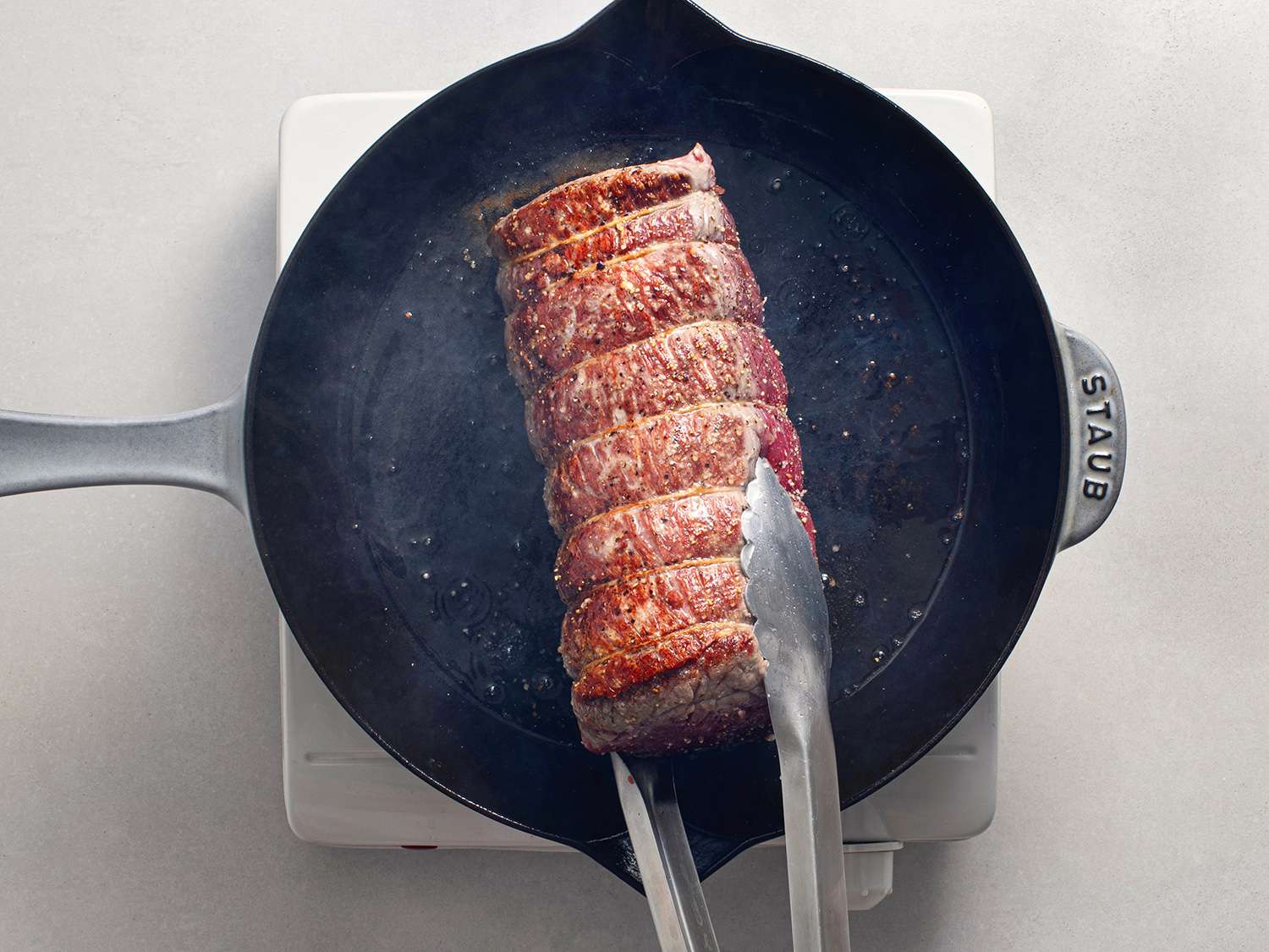 Searing the beef tenderloin